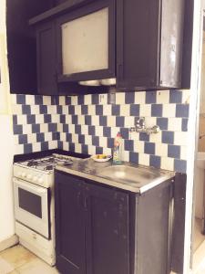 Una cocina o cocineta en Lagona Loft