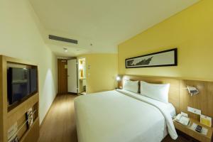 ibis Chennai Sipcot - An Accor Brand客房内的一张或多张床位