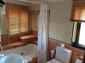 Koupelna v ubytování Hotel O Castelo