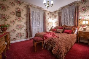 Posteľ alebo postele v izbe v ubytovaní Rezydencja Grawert Boutique & Spa