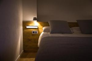 Ένα ή περισσότερα κρεβάτια σε δωμάτιο στο Casa Jou