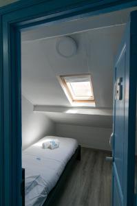 Säng eller sängar i ett rum på Change The World Hostels - Cascais - Estoril