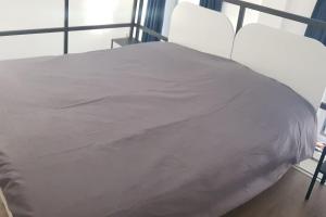A bed or beds in a room at Solari7