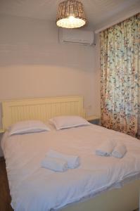 Letto o letti in una camera di Mebo House