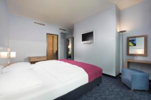 Postel nebo postele na pokoji v ubytování Seminaris CampusHotel Berlin