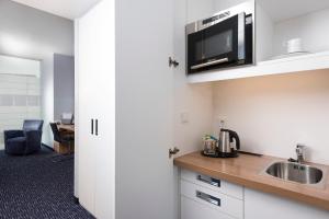 Kuchyň nebo kuchyňský kout v ubytování Seminaris CampusHotel Berlin
