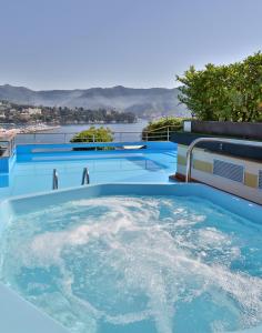 a hot tub with a view of the water at Regina Elena Dependance in Santa Margherita Ligure