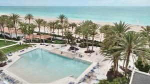 an overhead view of a pool and the beach at ROBINSON JANDIA PLAYA - Adults only in Morro del Jable