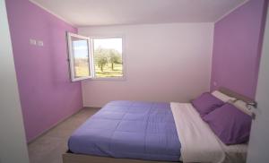Postel nebo postele na pokoji v ubytování RESIDENZA FIGURUJA