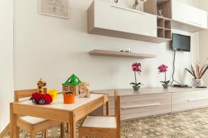 TV a/nebo společenská místnost v ubytování Casa Scilla