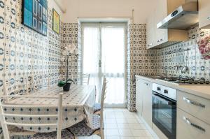 Kuchyň nebo kuchyňský kout v ubytování Casa Scilla