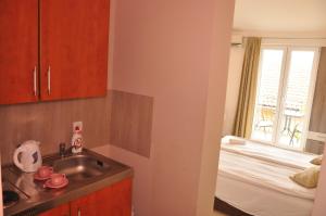 Postel nebo postele na pokoji v ubytování Guest House Damjana