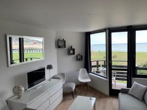 Телевизор и/или развлекательный центр в Les Marinas Port Deauville