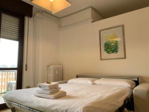 Posteľ alebo postele v izbe v ubytovaní Kibilù - Studio Fiera Milano, vicinanze Rho, linea rossa QT8