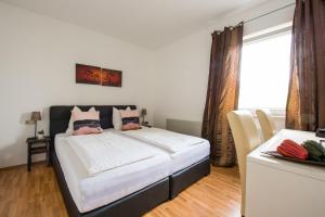 Ένα ή περισσότερα κρεβάτια σε δωμάτιο στο Pension Rosenhof