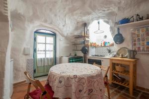 Kuchyň nebo kuchyňský kout v ubytování Casa Cueva Muntasal