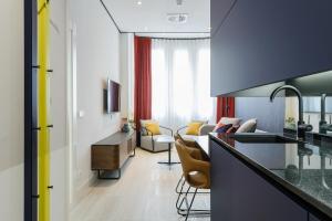 Posezení v ubytování Smartrental Collection Gran Vía Centric