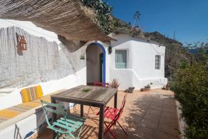 Photo de la galerie de l'établissement Casa Cueva Muntasal, à Monachil