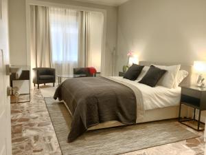 Postel nebo postele na pokoji v ubytování SILIA HOUSE Napoli Centro + 33 fotografií