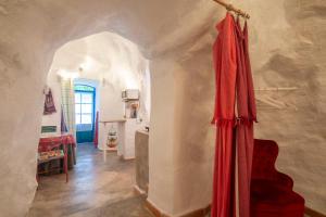 Postel nebo postele na pokoji v ubytování Casa Cueva Muntasal