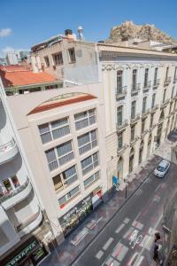 an overhead view of a city street with buildings at Tomate Rooms in Alicante