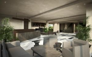 a lobby with chairs and tables and plants at Iris Hotel in Siviri