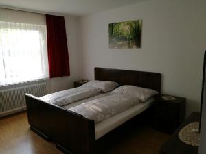 Ein Bett oder Betten in einem Zimmer der Unterkunft Haus Klara