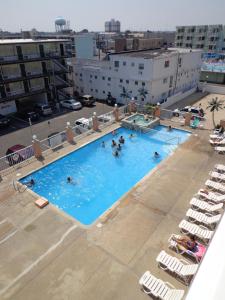 an overhead view of a large swimming pool on a building at Isle of Palms Motel in Wildwood