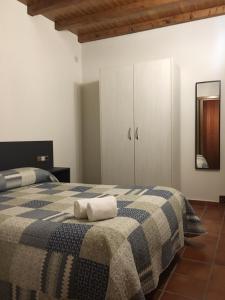 Postel nebo postele na pokoji v ubytování Casa Avellanas