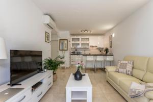 TV a/nebo společenská místnost v ubytování Adriatic Queen Rooms & Apartments