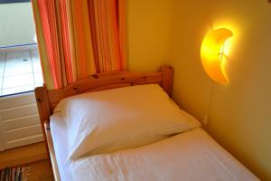Ein Bett oder Betten in einem Zimmer der Unterkunft Appartements Ferienwohnungen Alpenblick