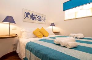 Posteľ alebo postele v izbe v ubytovaní Julia by PortofinoHomes
