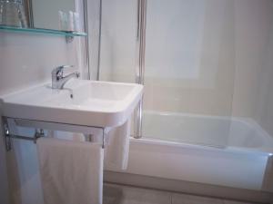Koupelna v ubytování Hotel Abadi