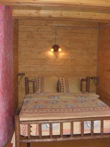 Postel nebo postele na pokoji v ubytování Chalet Truten