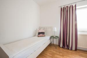 Ένα ή περισσότερα κρεβάτια σε δωμάτιο στο Pension Rosenhof