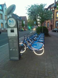 a row of bikes parked on the side of a street at Zweibettzimmer in Kaiserslautern