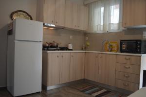A kitchen or kitchenette at The Beach House