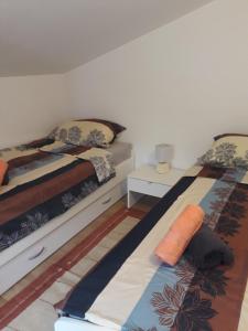 Postel nebo postele na pokoji v ubytování Kuca za odmor Luna + 35 fotografií