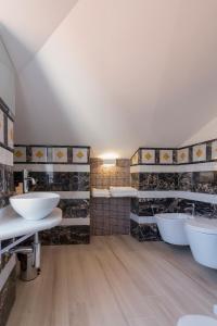 Ванная комната в Merlo d'Oro