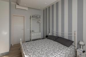 Postel nebo postele na pokoji v ubytování Merlo d'Oro