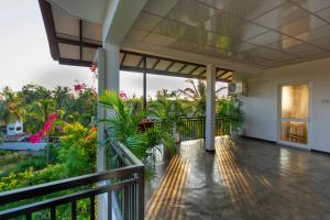 Un balcón o terraza en L&D Stay Inn