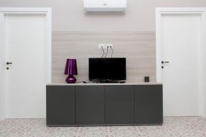TV a/nebo společenská místnost v ubytování Le tre rondini + 37 fotografií