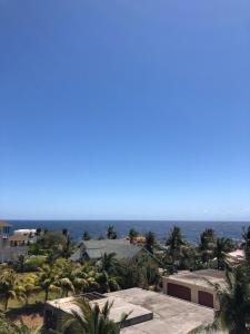 a view of the ocean from a resort at The Meridian at Lighthouse Point in West Bay