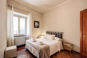 Llit o llits en una habitació de Appartamento Via del Monte della Farina