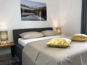Posteľ alebo postele v izbe v ubytovaní Apartments Villa Učka