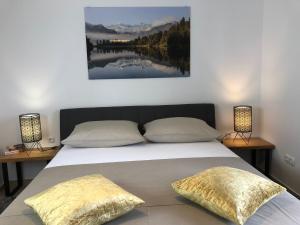 Postel nebo postele na pokoji v ubytování Apartments Villa Učka