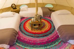 Glamping Finca Corazón客房内的一张或多张床位