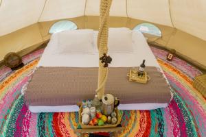 Glamping Finca Corazón客房内的一张或多张床位