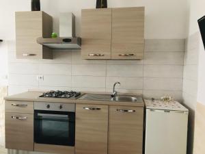 Virtuvė arba virtuvėlė apgyvendinimo įstaigoje Casa da Bea