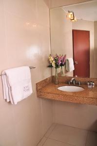 Um banheiro em Hotel Ferrua